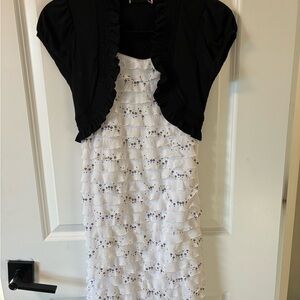 Girls White Sequin Ruffle Dress with Black Bolero